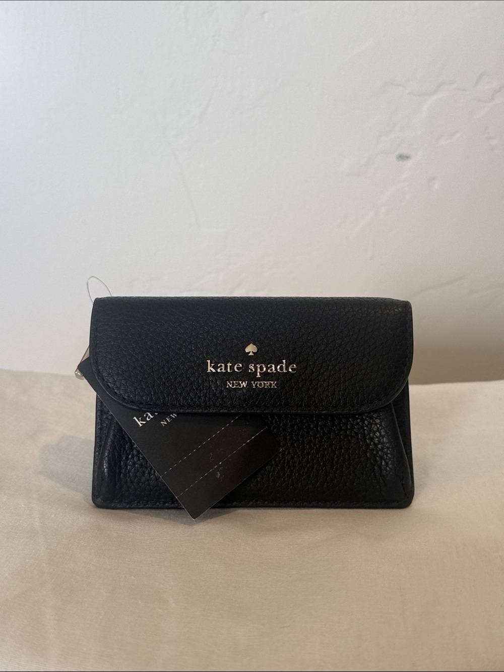 kate spade Black Pebbled Leather Mini Wallet with Gold Logo